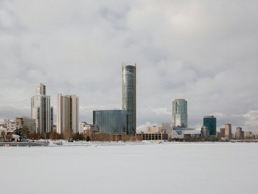 The towers across the frozen pond — Yekaterinburg, Russia