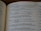 A close-up view of an open book displaying text from a section titled 'The Poetry Books.' Verses are numbered sequentially from 16 to 20 on the page, discussing themes of wisdom, friendship, and morality. The page number is visible in the top right corner, indicating 485.