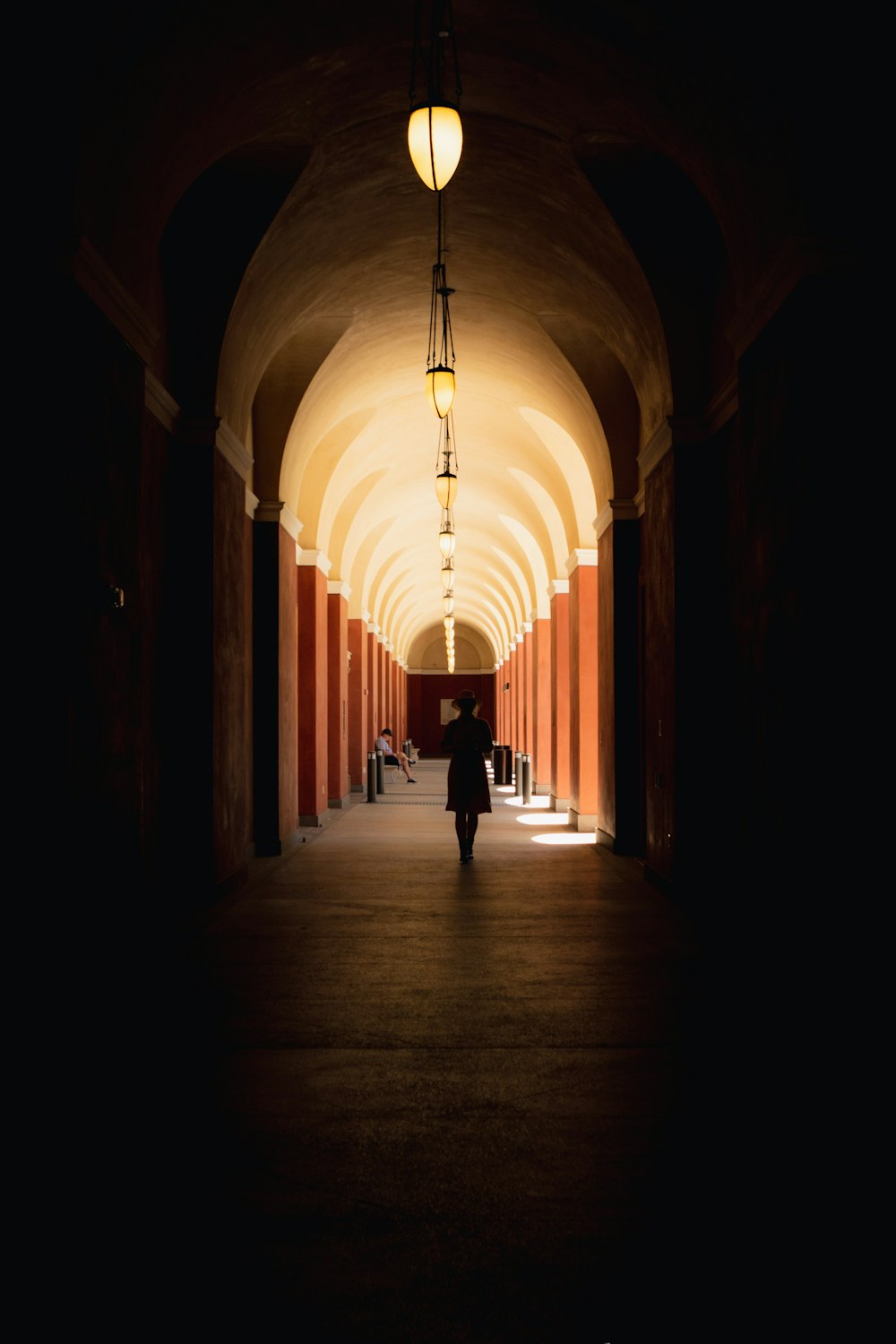 a person walking down a hallway