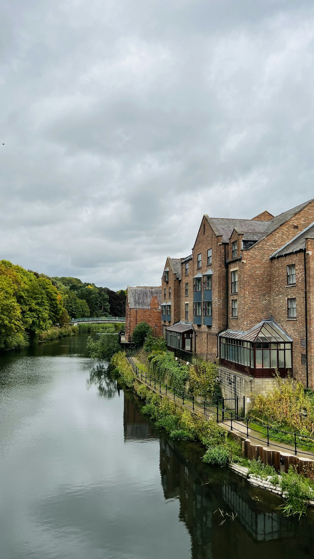 a river with buildings along it