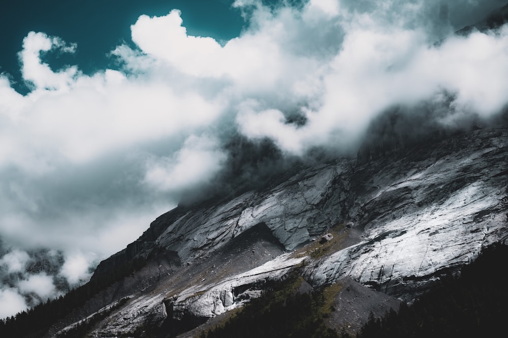 a mountain with clouds