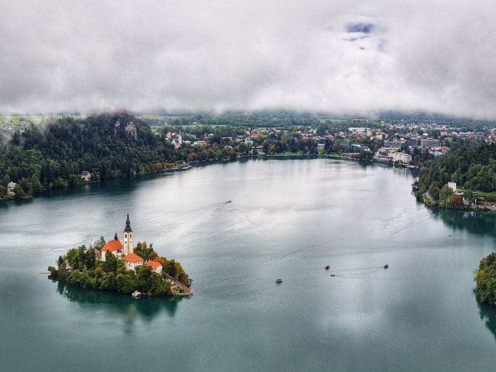 a small island with a building on it surrounded by water