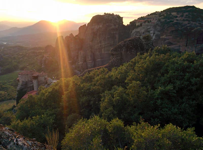 Golden sunlight spilling over jagged mountain ridges at dawn in Saint Catherine.