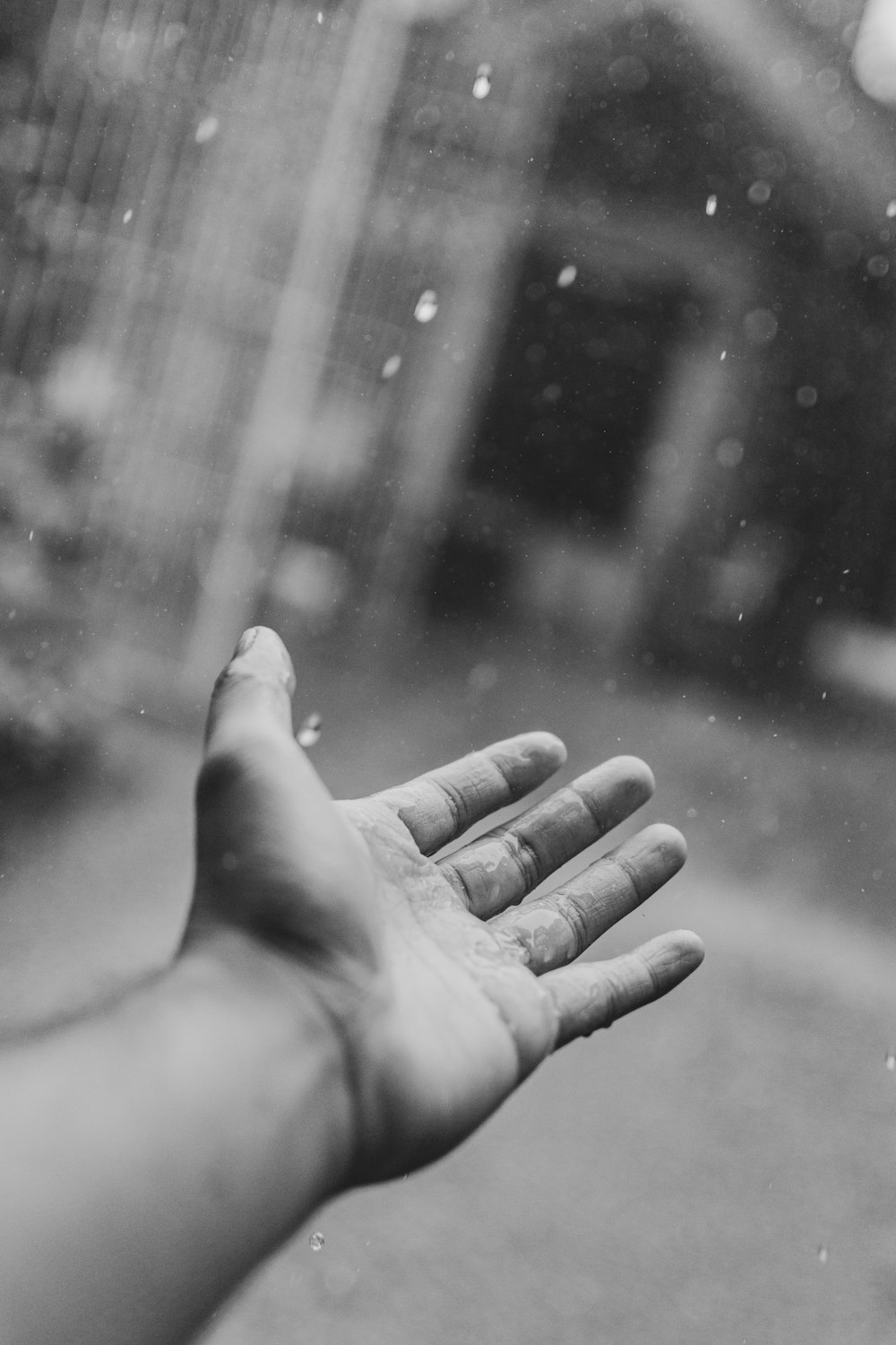 a person's foot on a wet surface