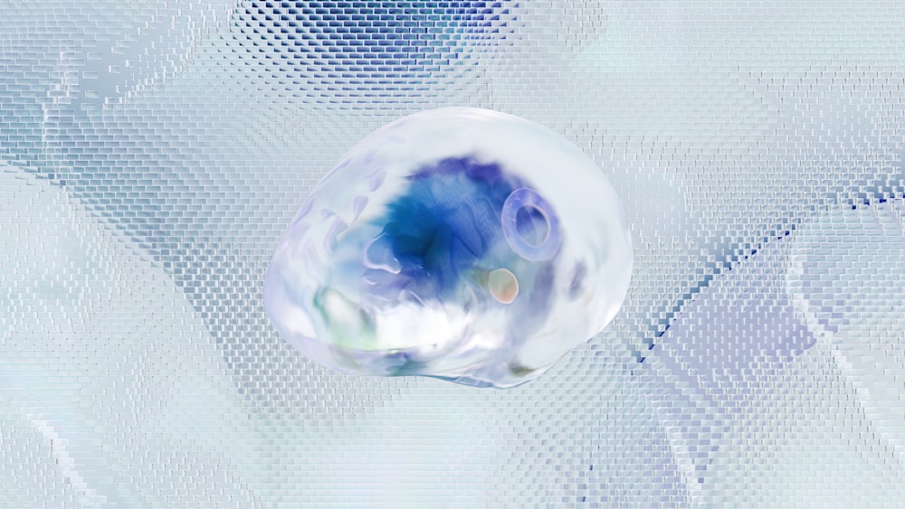 un oggetto sferico blu e bianco