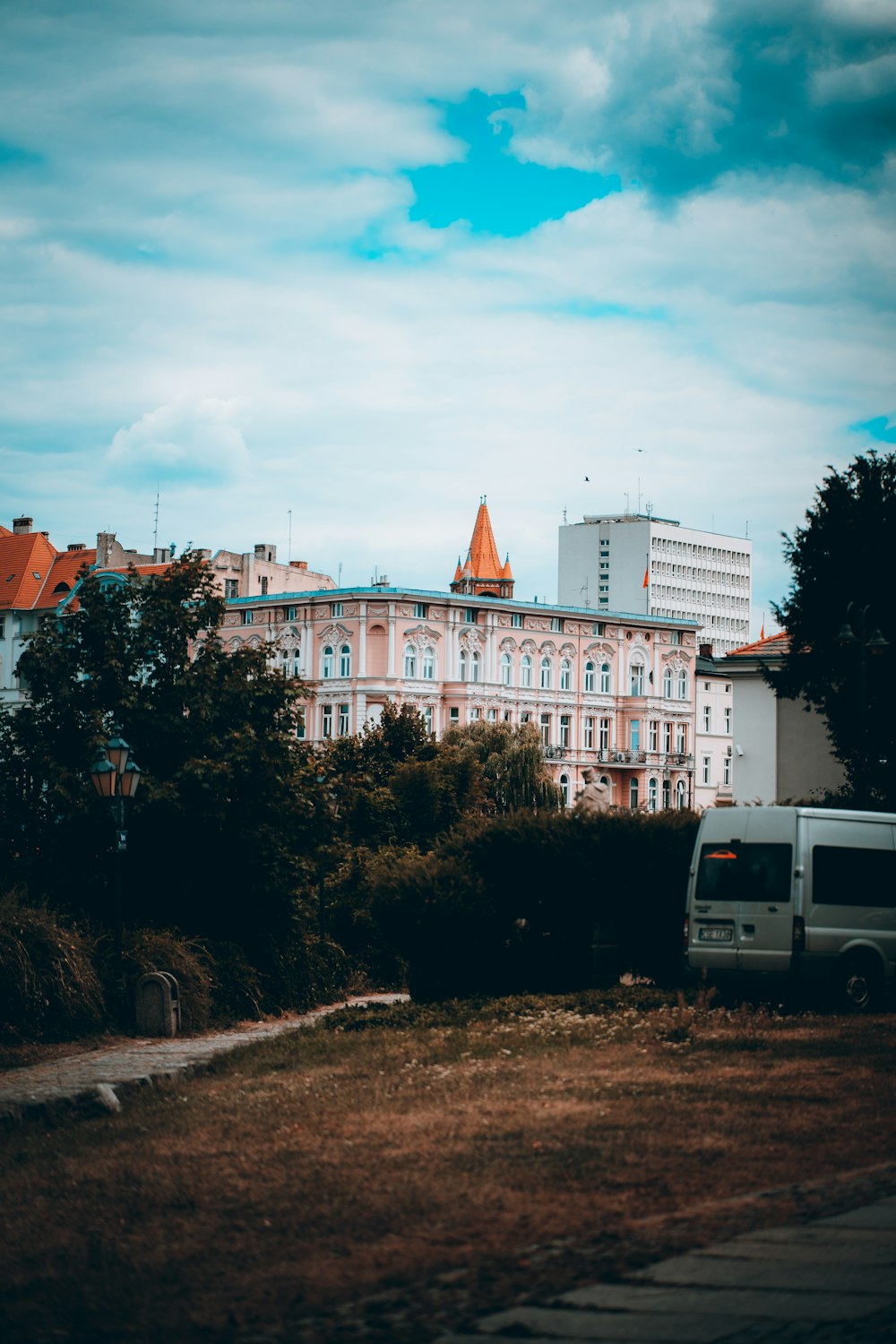 a large white building with a tower