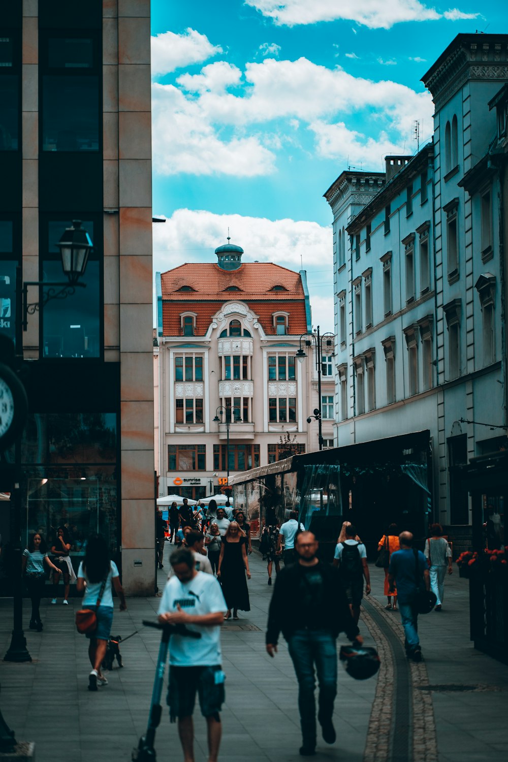 people walking on a street