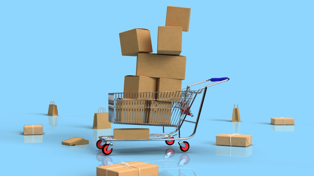 Small toy shopping cart symbolizing online shopping