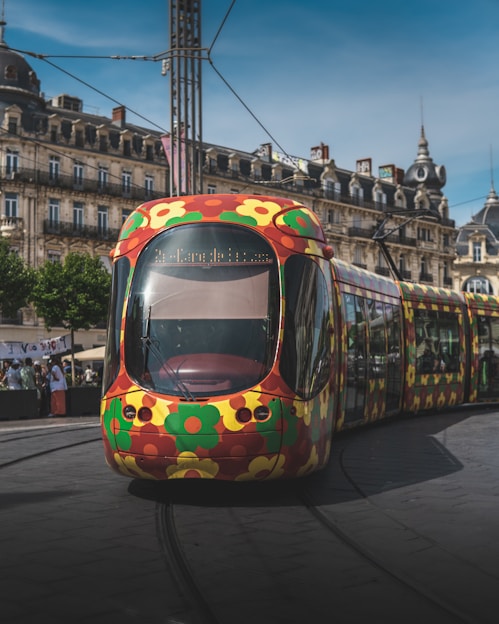 a yellow and red trolley