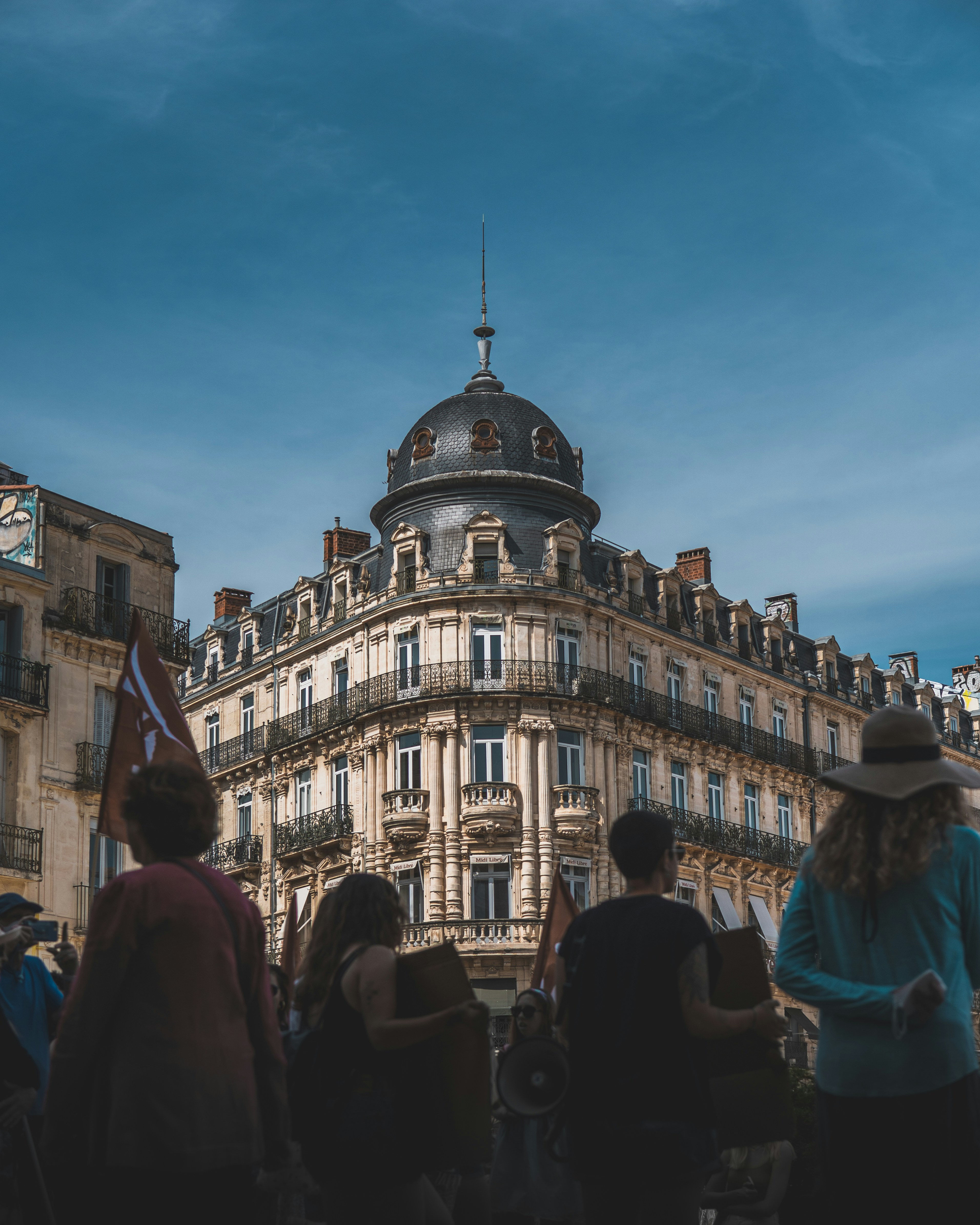 a group of people outside a building