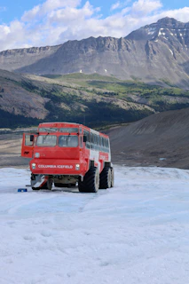 a red truck on a snowy road