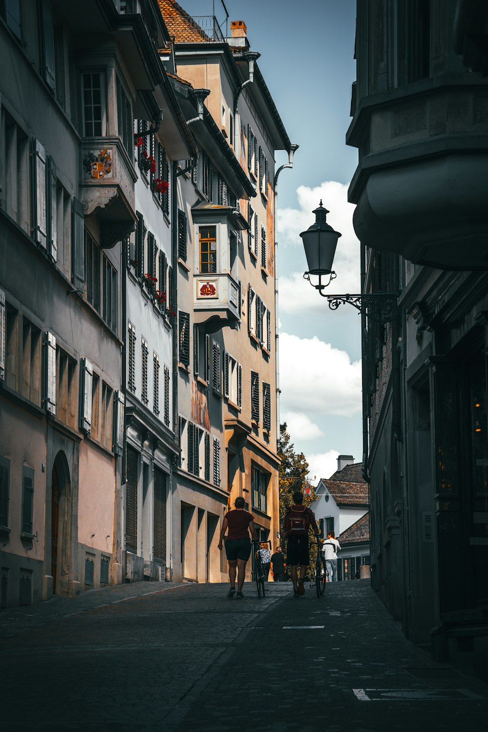 people walking down a street