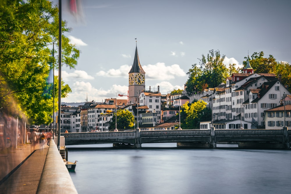 a bridge over a river with buildings on either side of it