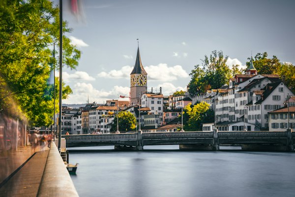 A bridge over a river with buildings on either side of it — Bern, Switzerland