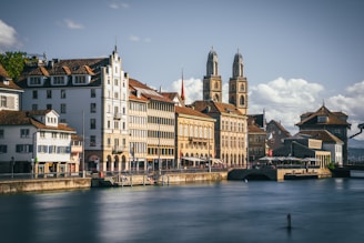 a body of water with buildings along it