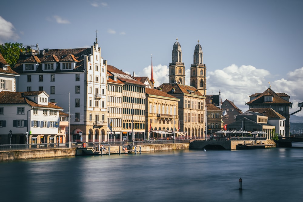 a body of water with buildings along it