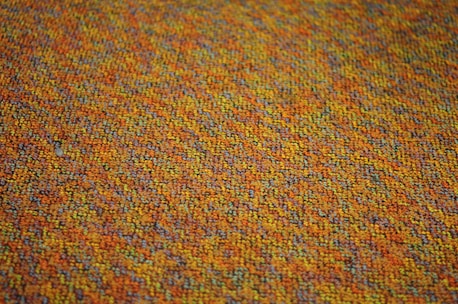 A vibrant entrance flooring made from recycled materials.