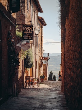 a narrow street with buildings on both sides
