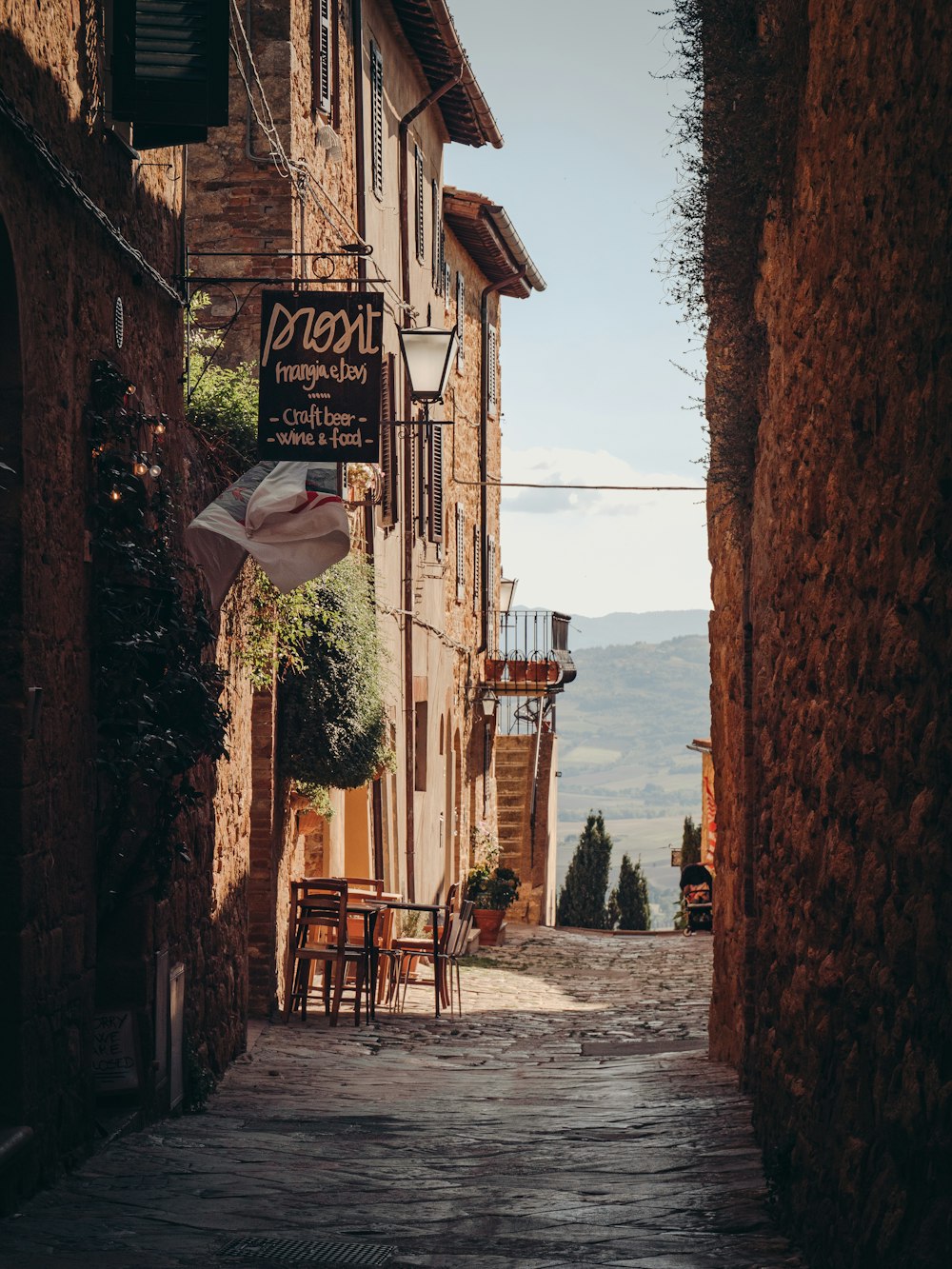 a narrow street with buildings on both sides