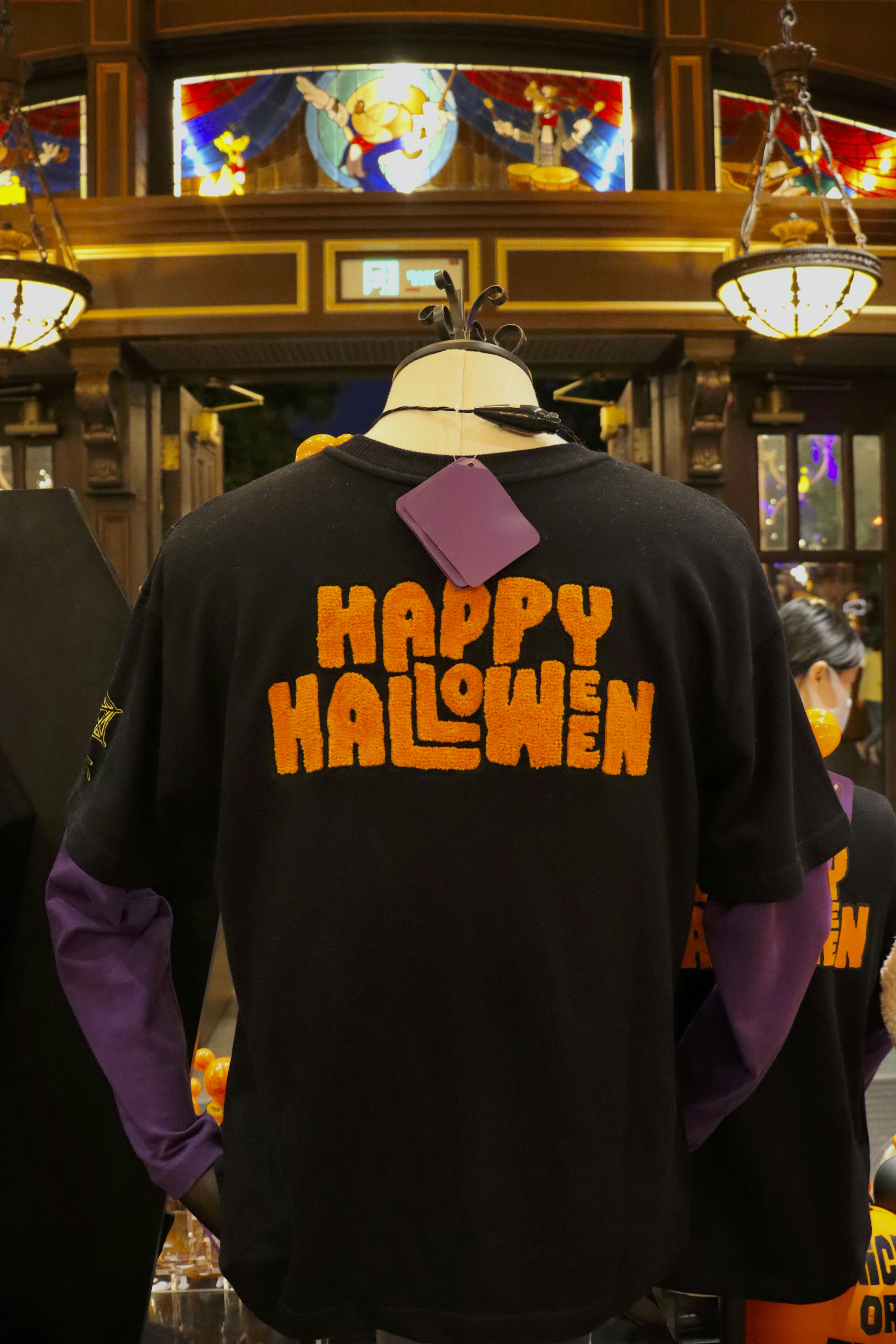 a person wearing a black shirt with a white hat and a white shirt