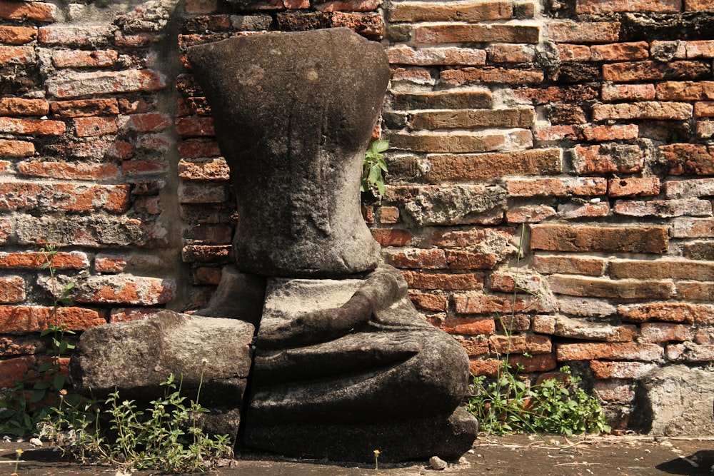 a stone statue of a person