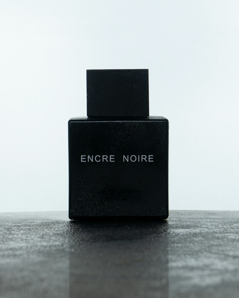 a black rectangular object with a white label on it