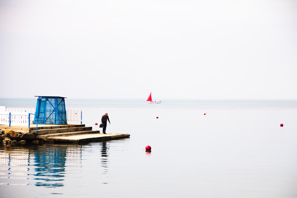 a person walking on a dock