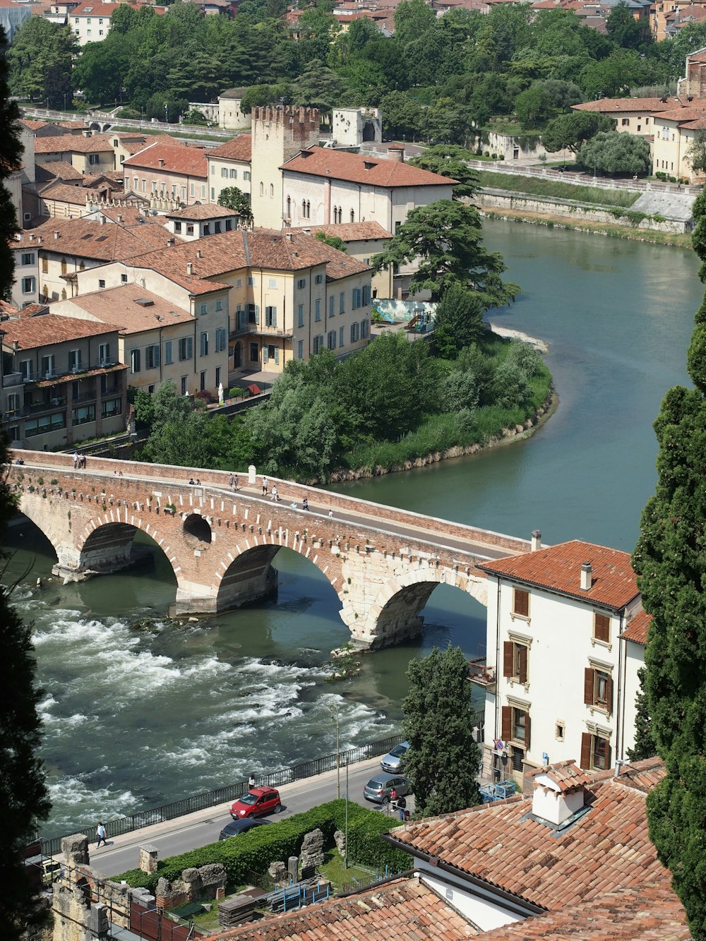 a bridge over a river with buildings on either side of it