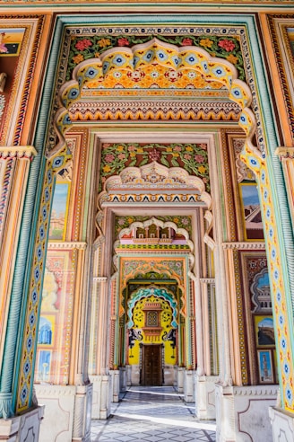 a colorful wall with a door