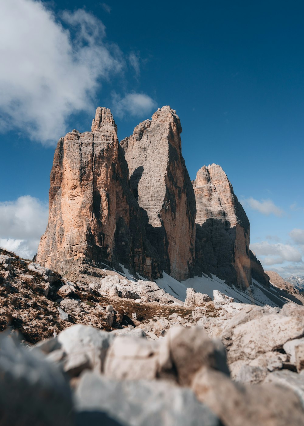 a rocky mountain with snow