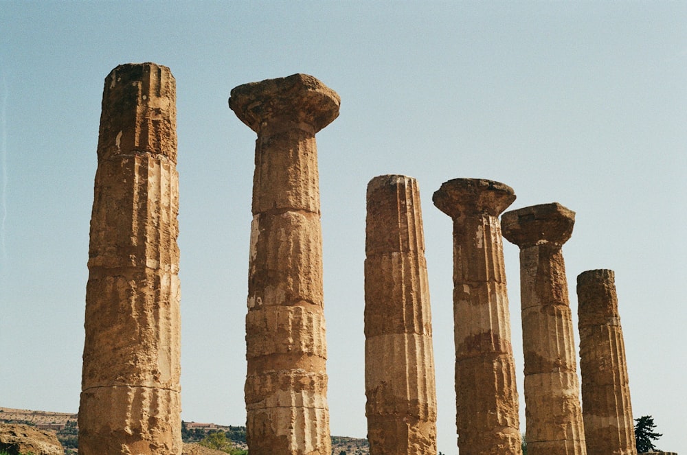 a group of stone pillars