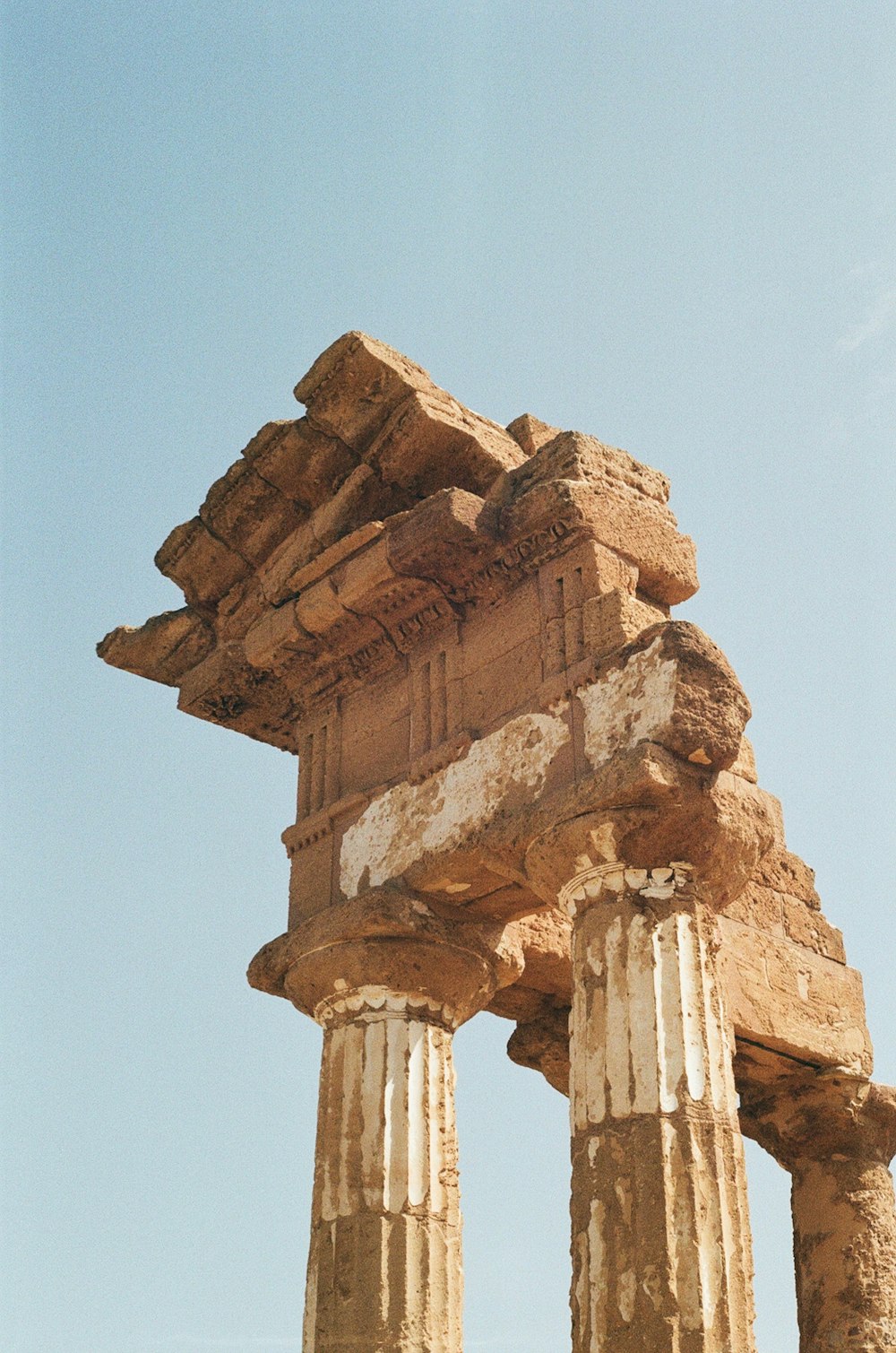 a stone structure with a blue sky