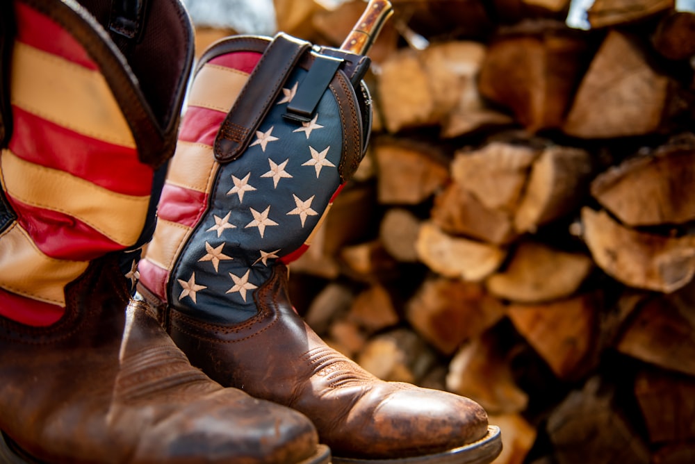 a pair of boots with a flag