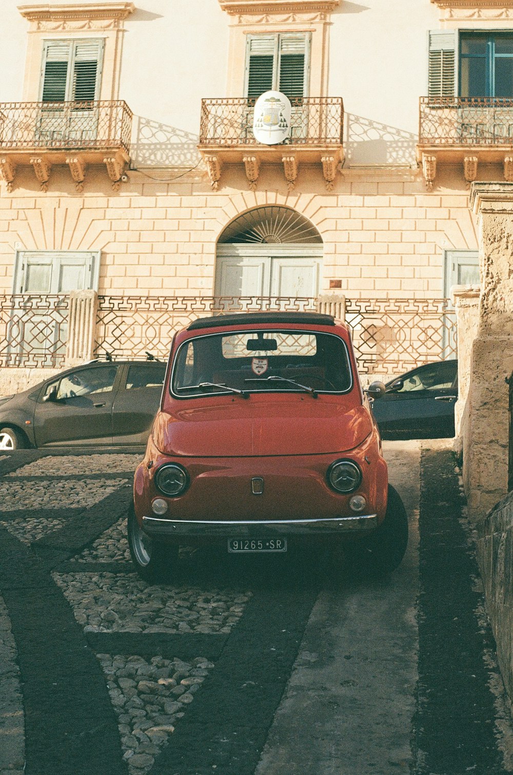 a car parked in front of a building