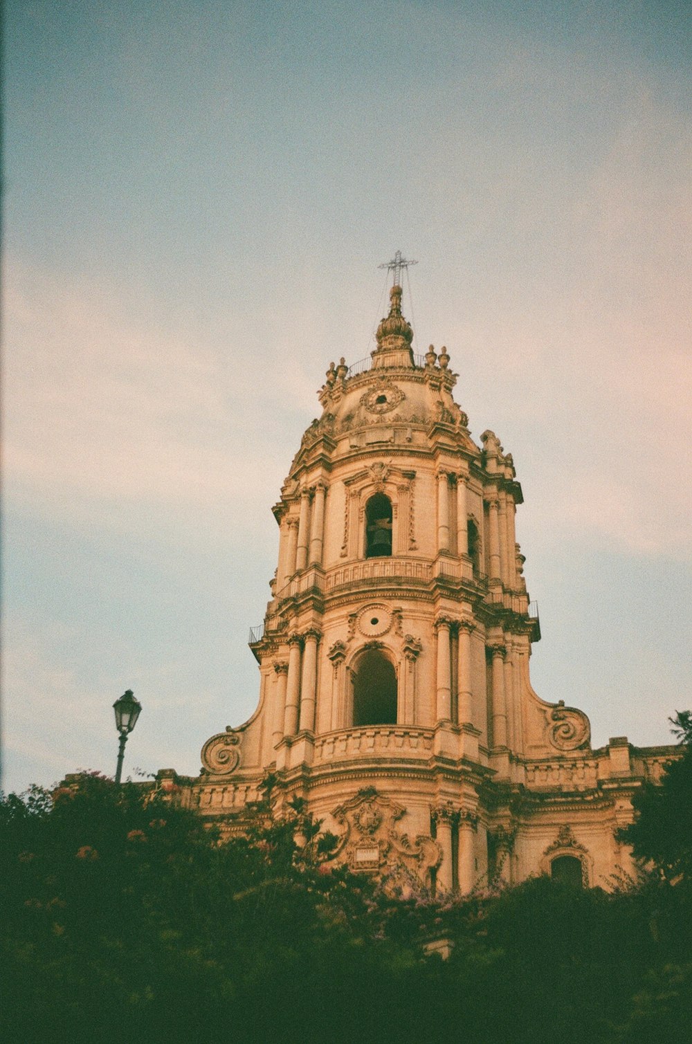 a large building with a cross on top