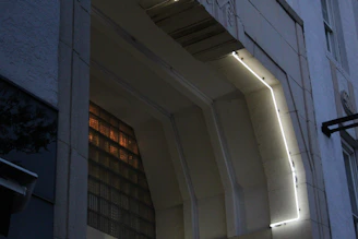 Architectural detail showing seamless integration of glass and aluminum frames