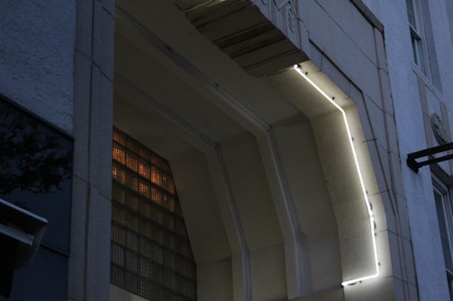 Close-up of a sleek architectural detail bathed in soft natural light.