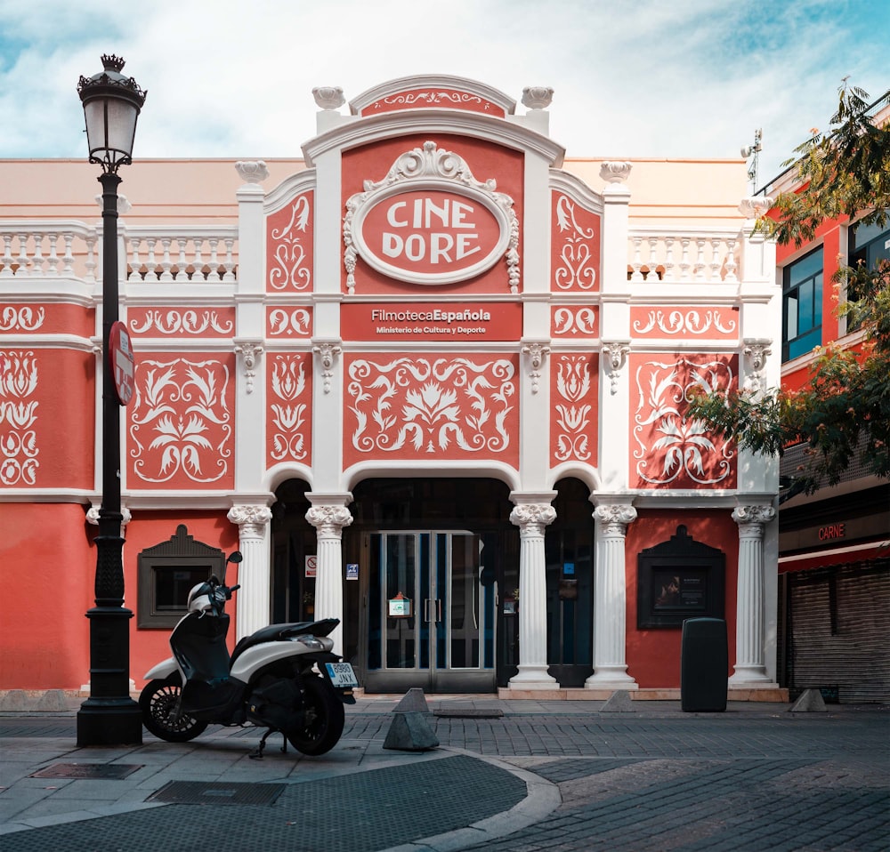 a motorcycle parked in front of a building