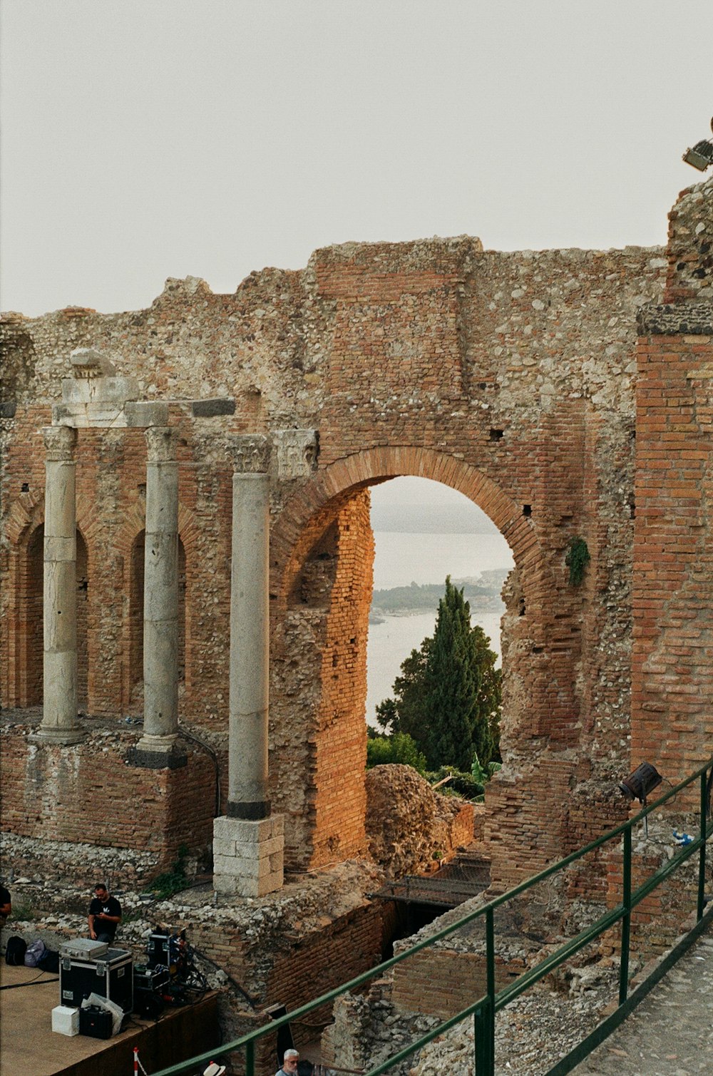 a brick archway with columns