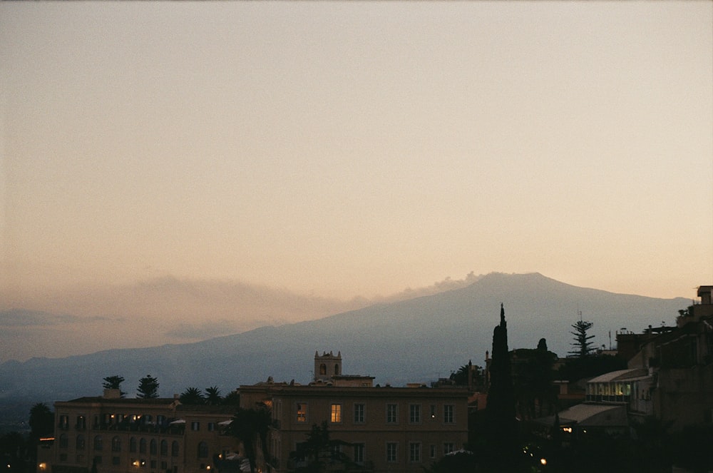 a city with a mountain in the background