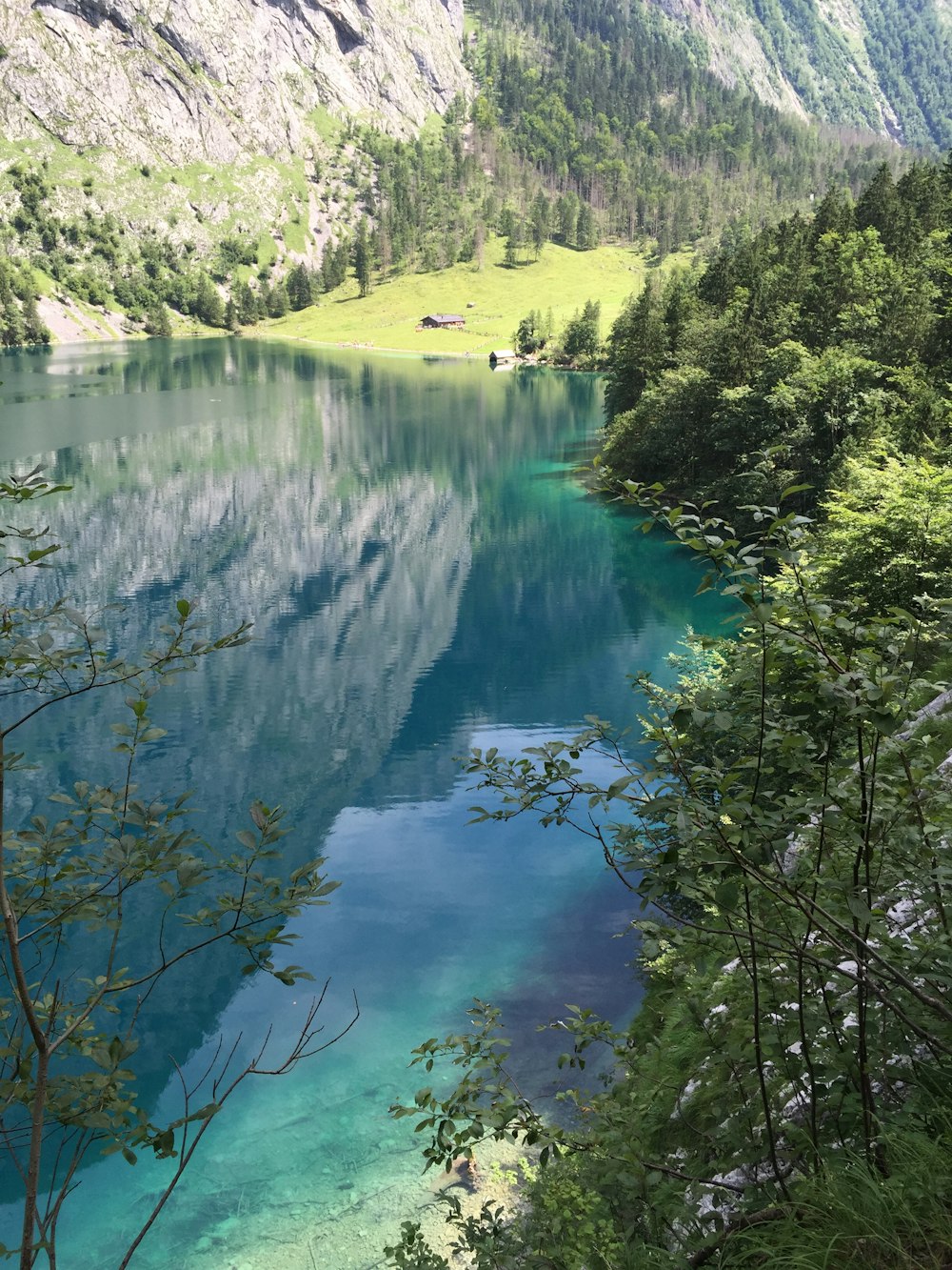 a lake surrounded by mountains