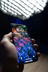 A sharp neon-lit smartphone screen displaying a perfectly timed text response.