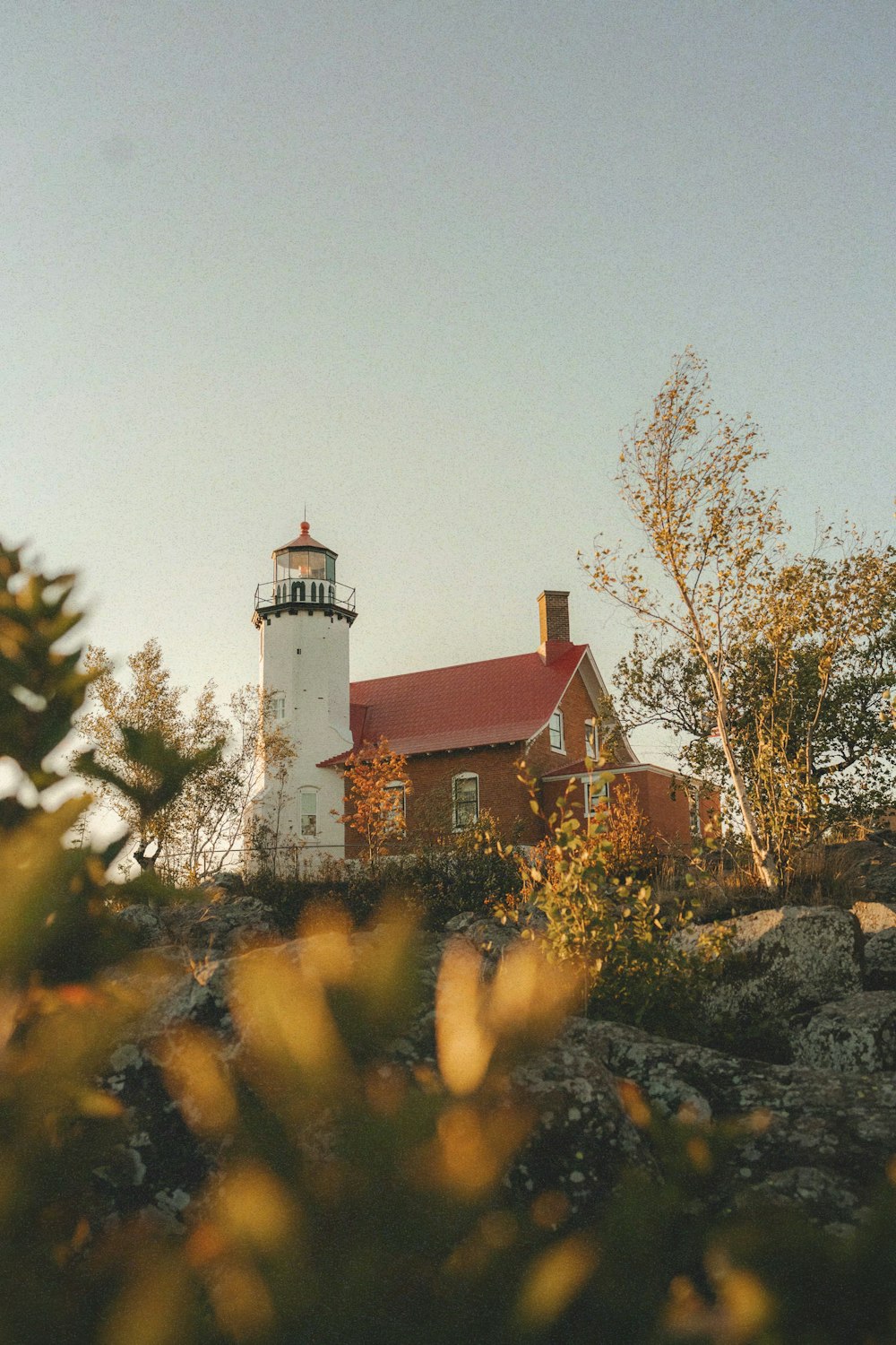 a lighthouse on a hill