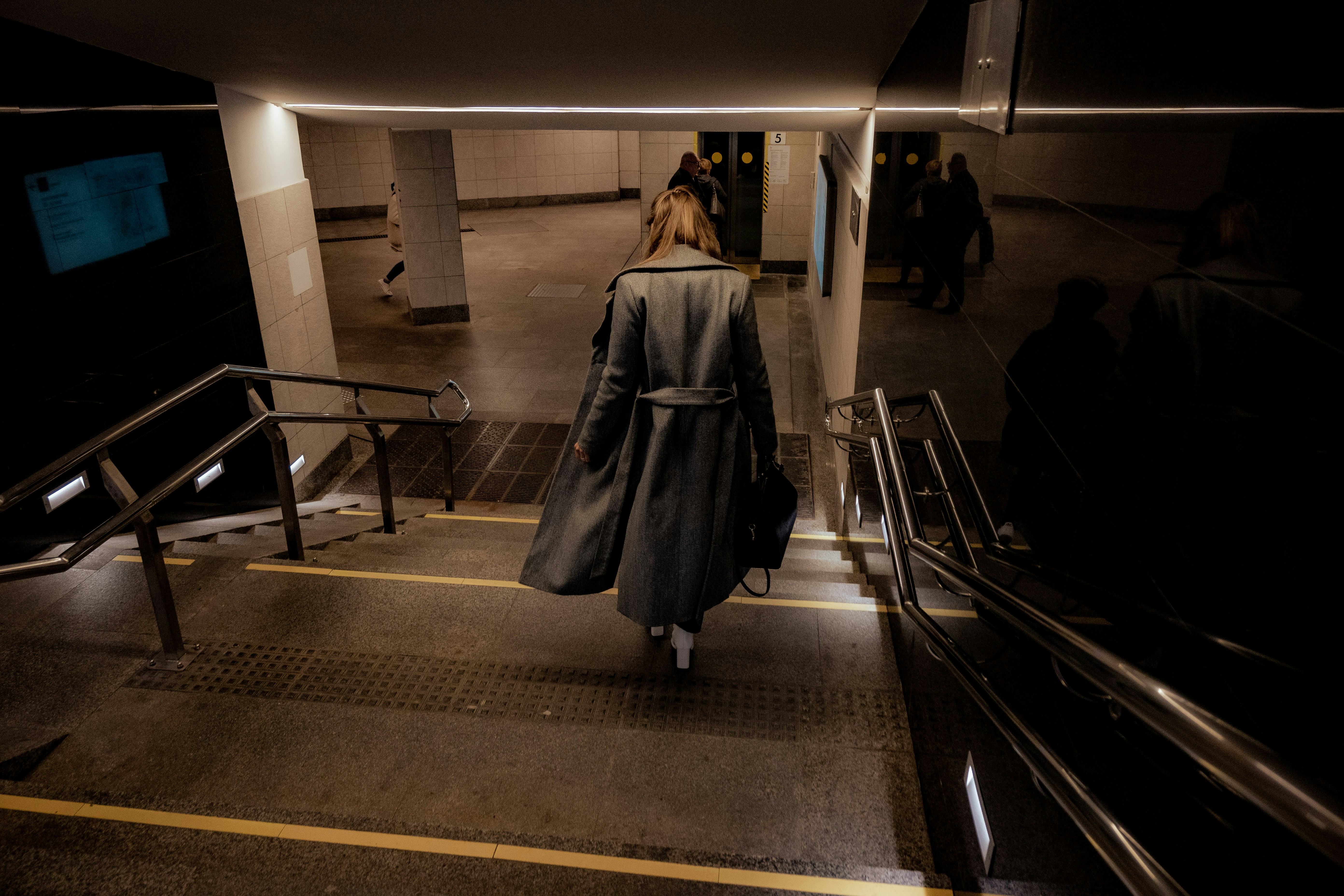 a person walking down a flight of stairs