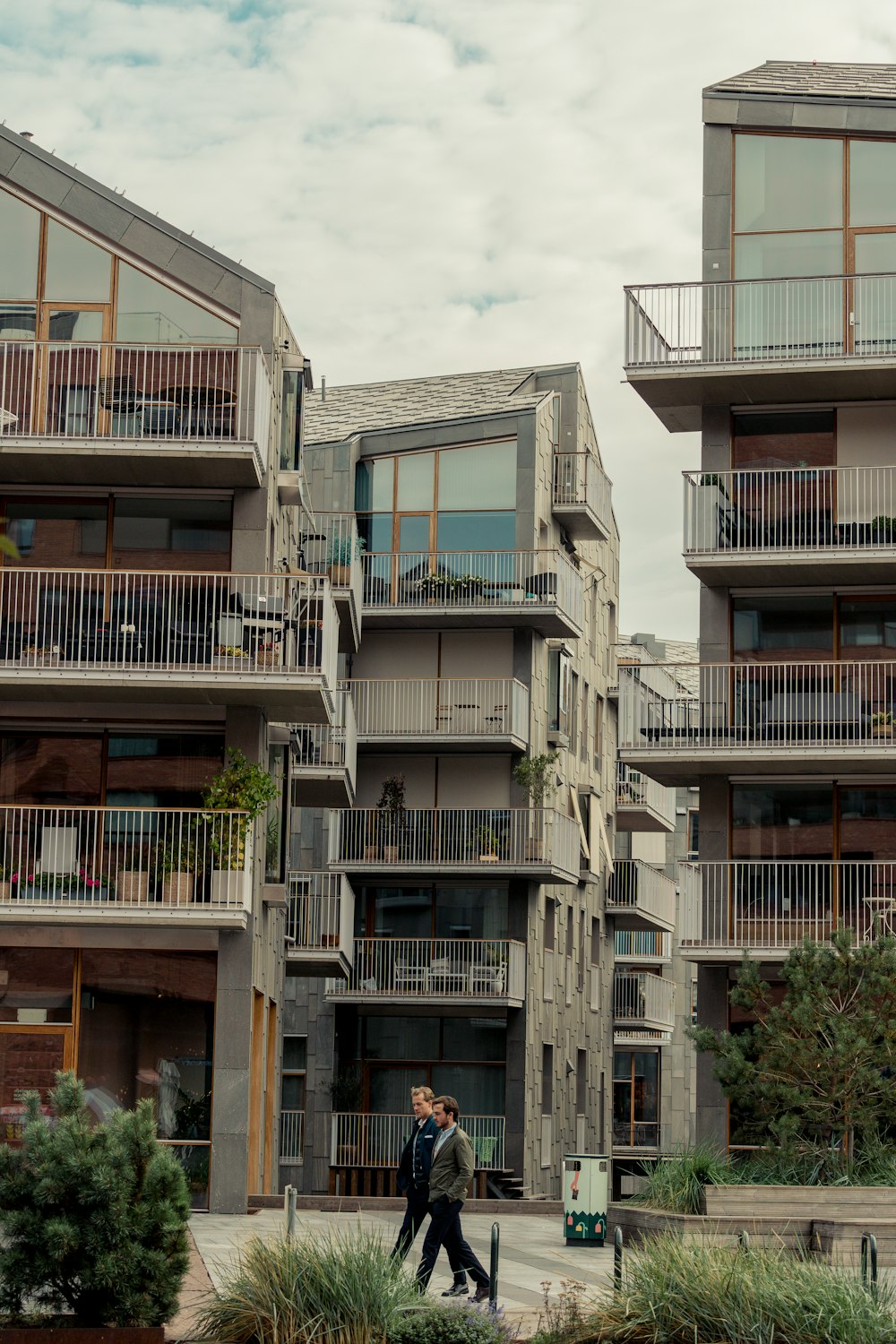 a person walking in front of a building