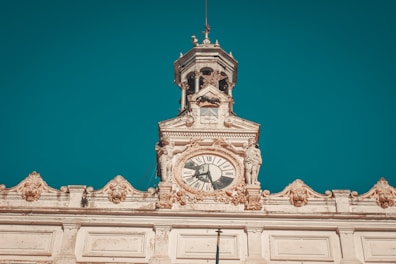 Artistic photo print featuring the clock tower integrated with cultural symbols.