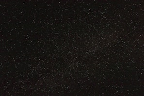 A starry night sky filled with constellations and celestial bodies.