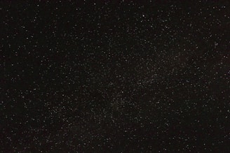 A starry night sky filled with constellations and celestial bodies.