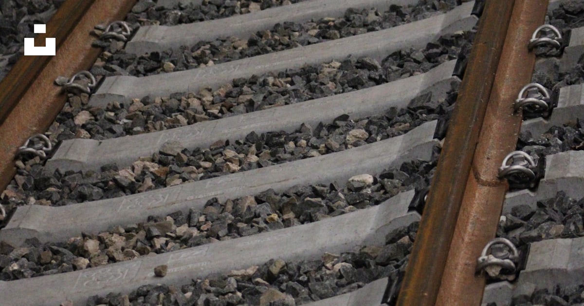 A railroad track with rocks photo – Free Grey Image on Unsplash