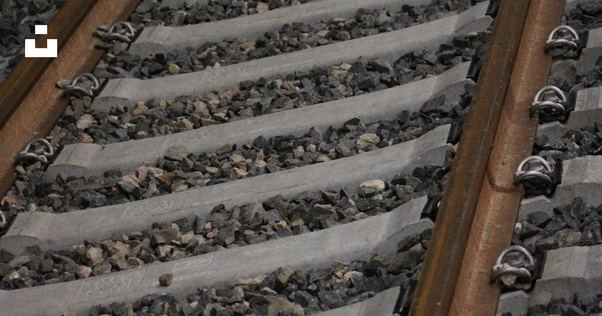 A railroad track with rocks photo โ Free Grey Image on Unsplash